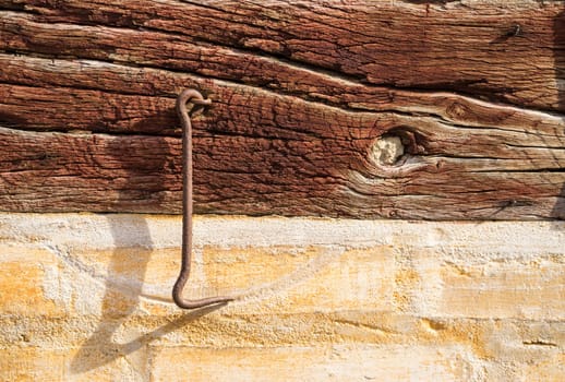 Detail of cracked painted oak timber European-known style, half-timbered building