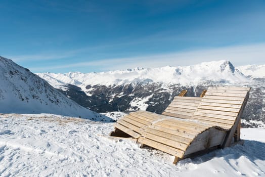 Mountain panorama in front of a blue sky in winter