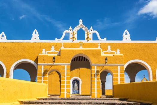 Entrance to the beautiful yellow colonial monastery in Izamal, Mexico
