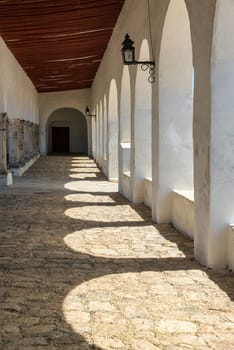 Old colonial corridor in the monastery in Izamal, Mexico