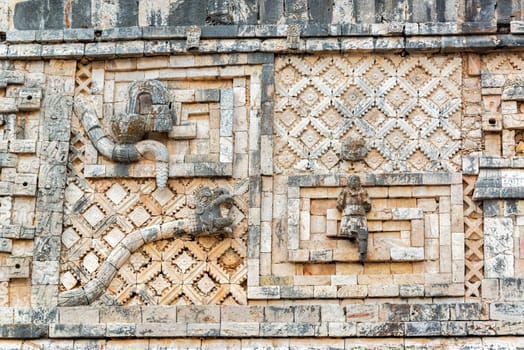 Striking details in the ruins of the ancient Mayan city of Uxmal, Mexico