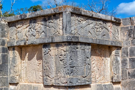 Beautiful details of carvings on the platform of the eagles and jaguars in the Mayan ruins of Chichen Itza in Mexico