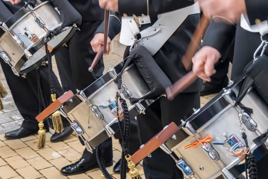 Musicians playing drums in a band