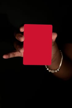 red card hand holding