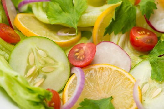 Homemade fresh green vegetable salad on table. Close-up.