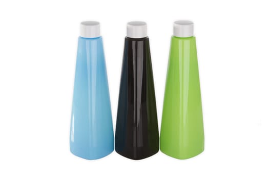 Three plastic bottles exposed on a white background