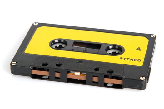 Cropped music cassette on white background