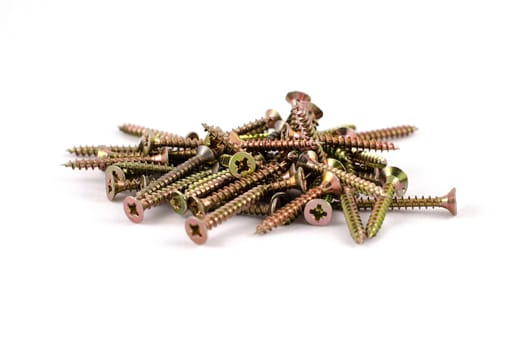 Zinked and anodized screws frame. Close-up. Macro.