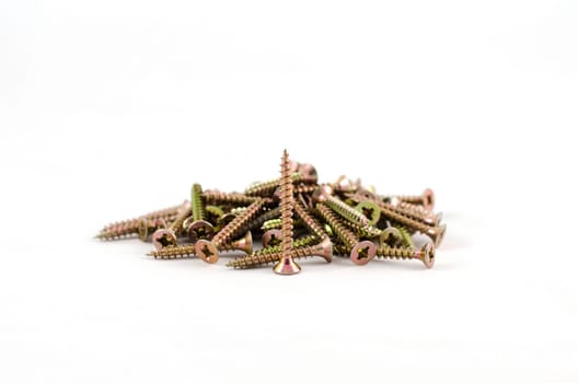 Zinked and anodized screws frame. Close-up. Macro.