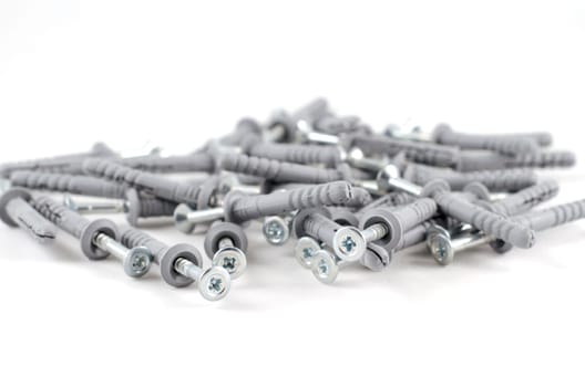 Metallic screws isolated over white background