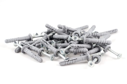 Metallic screws isolated over white background