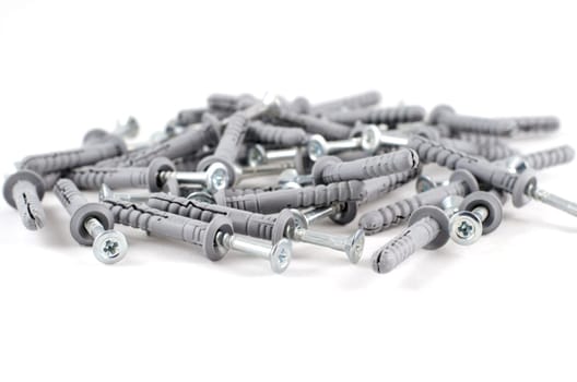Metallic screws isolated over white background