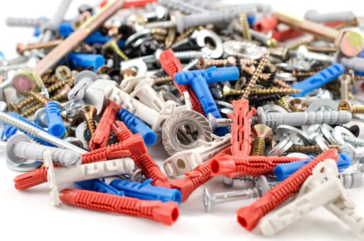 Nuts bolts and screws isolated over white background