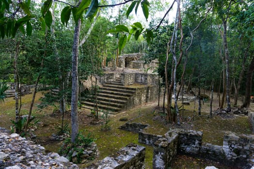 Mayan ruins in Coba, Mexico surrounded by jungle