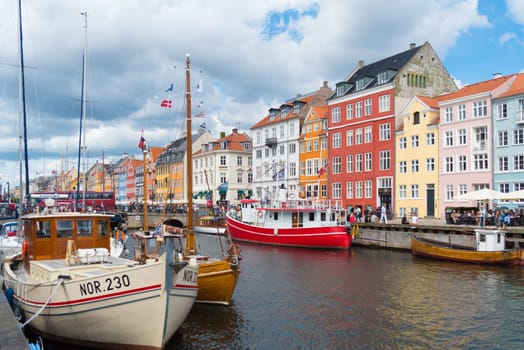 COPENHAGEN, DENMARK - JULY 31, 2016: Summer view of the famous Nyhavn with its colorful buildings