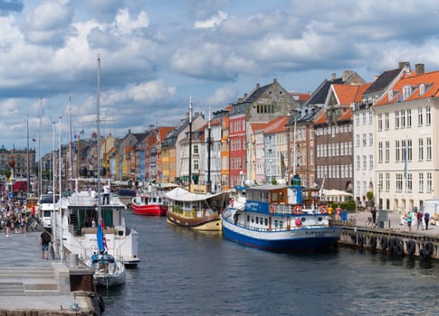 COPENHAGEN, DENMARK - JULY 31, 2016: Summer view of the famous Nyhavn with its colorful buildings