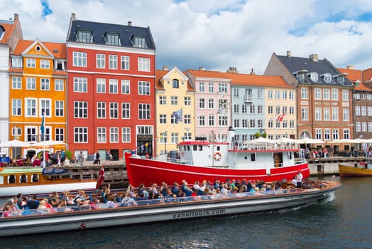 COPENHAGEN, DENMARK - JULY 31, 2016: Summer view of the famous Nyhavn with its colorful buildings