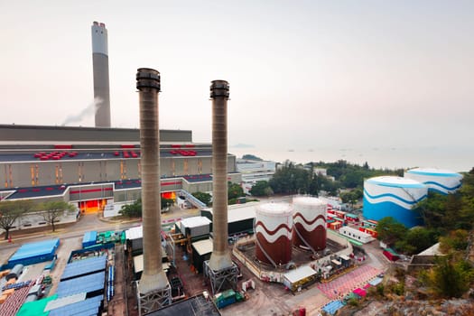 Hong Kong power station at sunset , Glow light of petrochemical industry