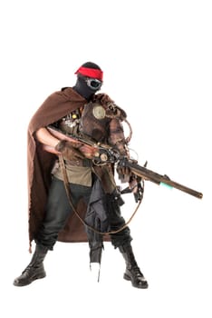 Futuristic soldier posing with gun and armor isolated in white