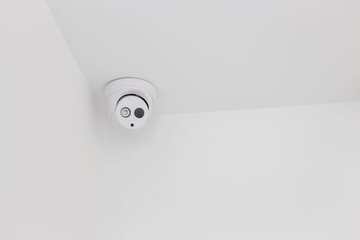 Ceiling Corner Of White Security Camera, stock photo