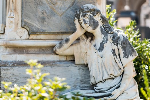 ornamental statuette for the graves of the cemetery