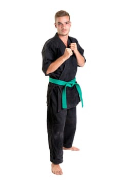 Martial arts student isolated in a white background