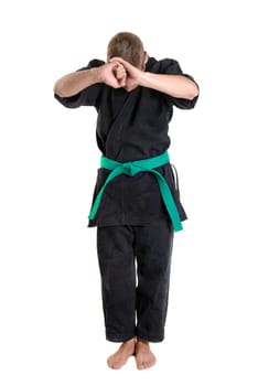 Martial arts student isolated in a white background