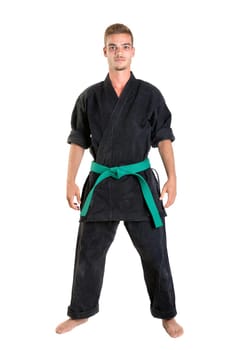Martial arts student isolated in a white background