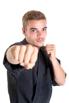 Martial arts student isolated in a white background