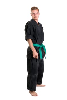 Martial arts student isolated in a white background