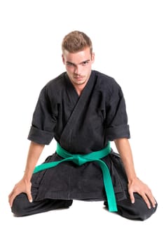 Martial arts student isolated in a white background