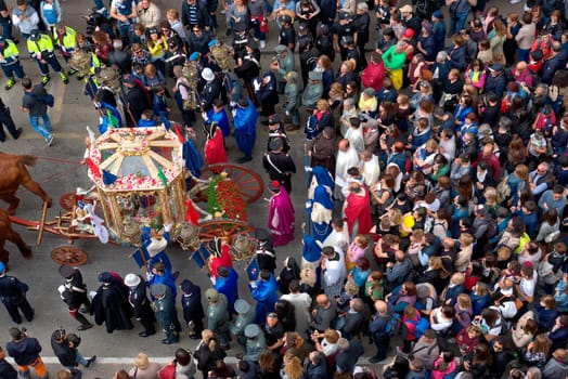 Cagliari, Italy - May 1, 2017: religious procession of Sat'Efisio - Sardinia - Parade of sardinian traditional costumes. Pilgrims from above.