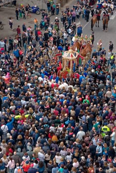 Cagliari, Italy - May 1, 2017: religious procession of Sat'Efisio - Sardinia - Parade of sardinian traditional costumes. Pilgrims from above.
