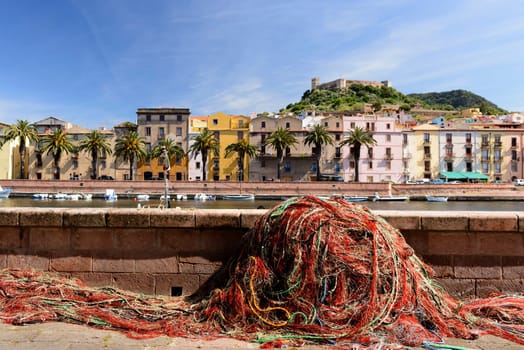 Cumulus of red nets for fishing. Along the Temo river in Bosa, Sardinia.