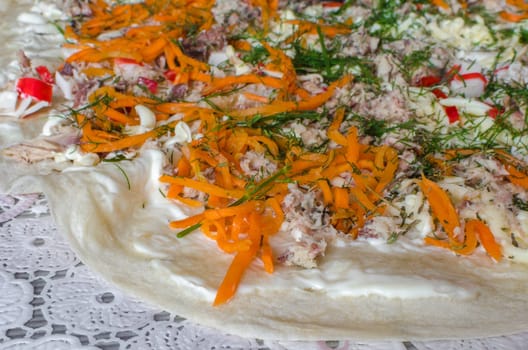 The pizza is ready for cooking, closeup
