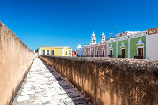 Colorful colonial buildings in Campeche, Mexico as seen from atop the defensive wall