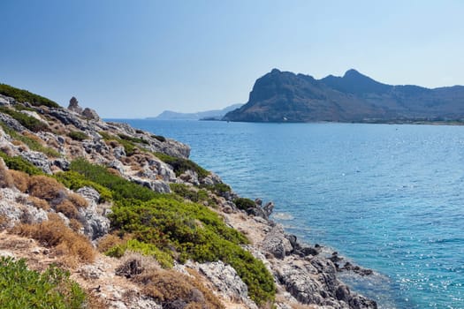 Kolymbia beach with the rocky coast in Greece.