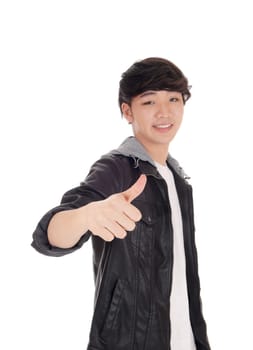 A handsome Asian man standing gesturing with his thump up.in a gray jacket, isolated for white background..
