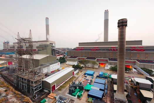 Hong Kong power station at sunset , Glow light of petrochemical industry