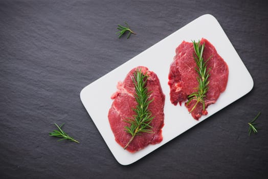 Raw beef meat sliced on a plate