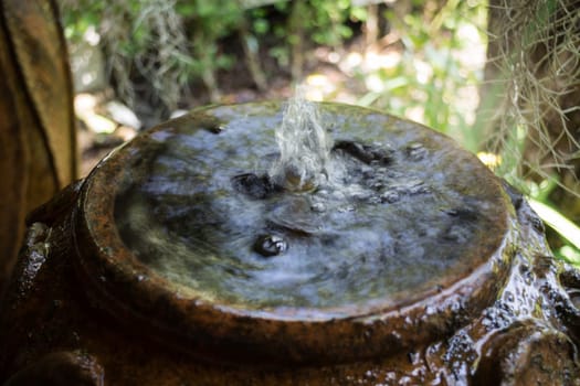 Home Garden Decorated With Vintage Fountain, stock photo