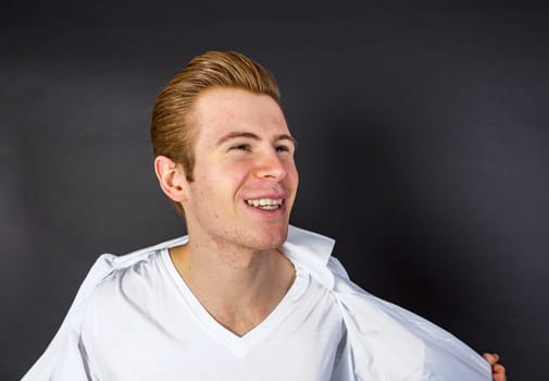 portrait of cool looking teenage boy in studio