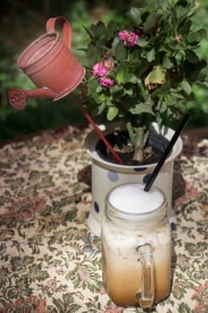 Iced Milk Coffee On Outdoor Table, stock photo