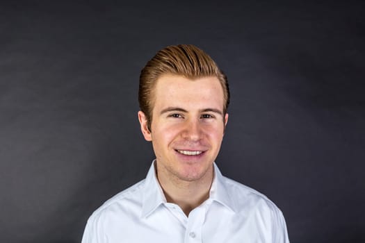 portrait of cool looking teenage boy in studio