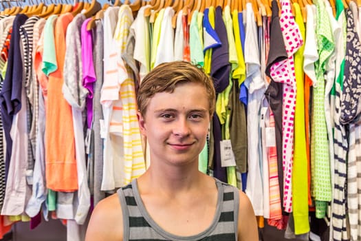 boy enjoys shopping in Miami in Ocean drive by night