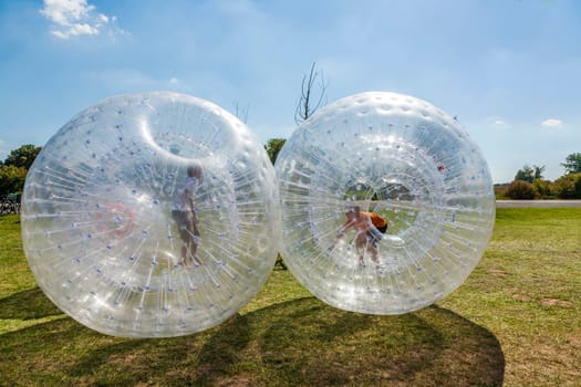 children have a lot of fun in the Zorbing Ball