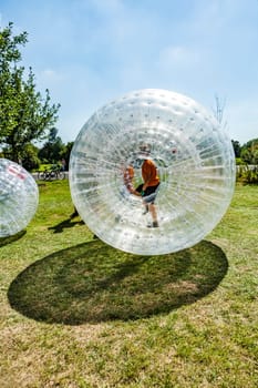 children have a lot of fun in the Zorbing Ball