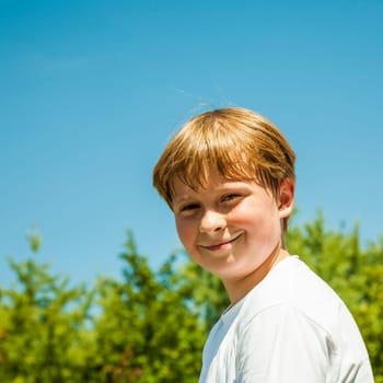 happy boy is smiling and enjoying life