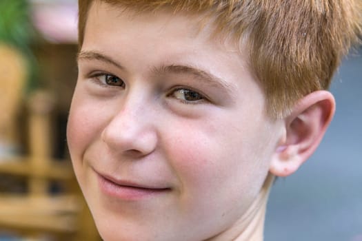 cute smiling boy with red hair