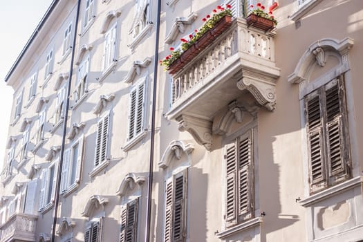 facade of Italian building in Trieste with beautiful balcony